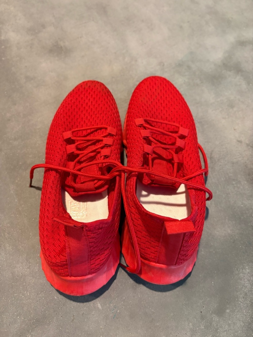 Red slip on gym shoes